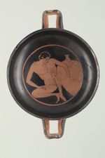 Schale (Kylix) mit kauerndem Jüngling
